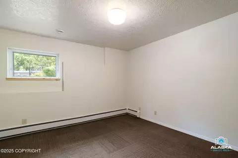 Bedroom - 4477 Panther Dr, Eagle River, AK 99577 photo 5 of 6