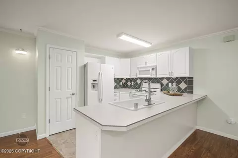 Kitchen - 16627 River Heights Loop, Eagle River, AK 99577 photo 2 of 3