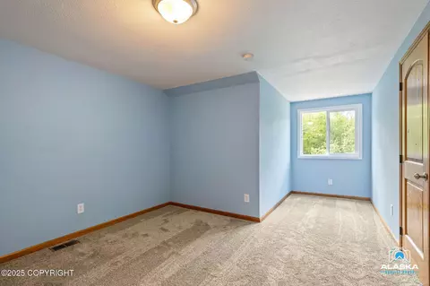 Bedroom - 18864 Mountain Rd, Chugiak, AK 99567 photo 5 of 7