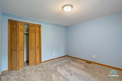 Bedroom - 18864 Mountain Rd, Chugiak, AK 99567 photo 4 of 7