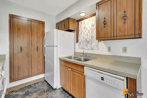 Kitchen - 268 Fireoved Dr, Anchorage, AK 99508 photo 2 of 3