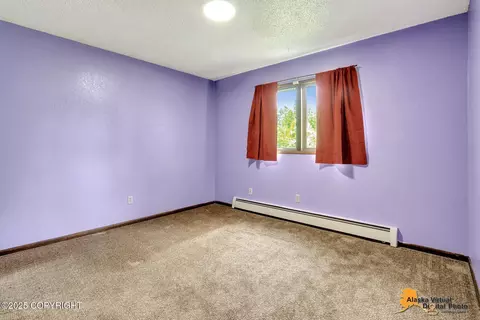 Bedroom - 268 Fireoved Dr, Anchorage, AK 99508 photo 3 of 4