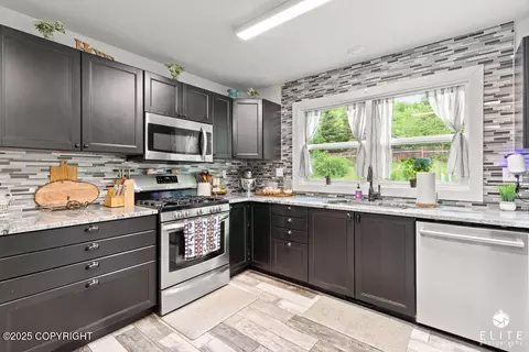 Kitchen - 19920 Tulwar Dr, Chugiak, AK 99567 photo 2 of 3