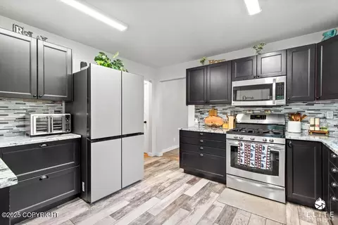 Kitchen - 19920 Tulwar Dr, Chugiak, AK 99567 photo 3 of 3