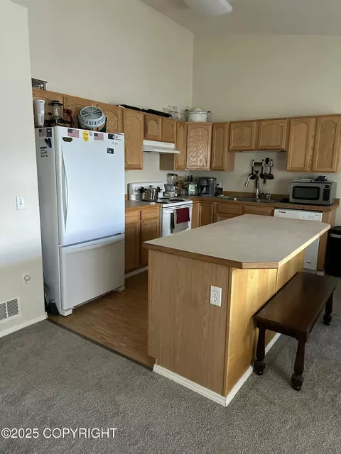 Kitchen - 17491 Fire Eagle Way # 6, Eagle River, AK 99577 photo 1 of 2