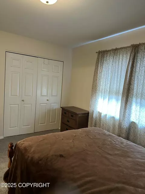 Bedroom - 17491 Fire Eagle Way # 6, Eagle River, AK 99577 photo 5 of 5