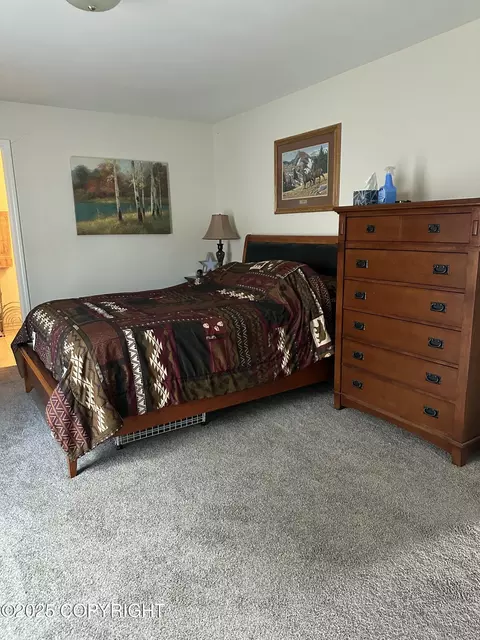 Bedroom - 17491 Fire Eagle Way # 6, Eagle River, AK 99577 photo 2 of 5