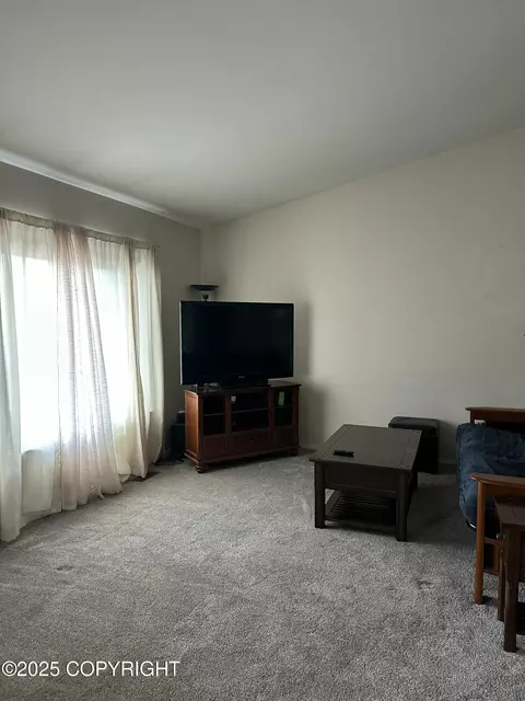 Living - 17491 Fire Eagle Way # 6, Eagle River, AK 99577 photo 1 of 2