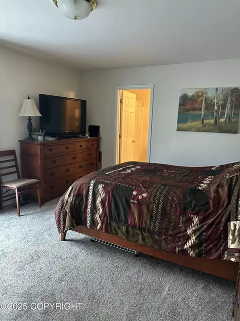 Bedroom - 17491 Fire Eagle Way # 6, Eagle River, AK 99577 photo 1 of 5