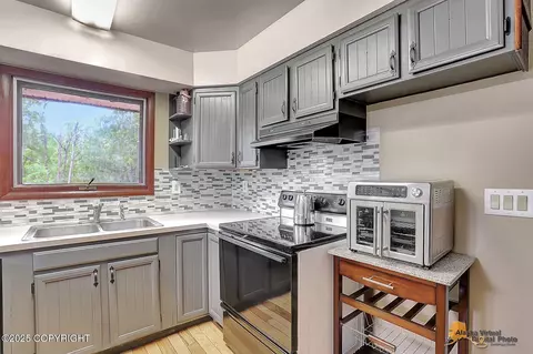 Kitchen - 910 S Iris Cir, Palmer, AK 99645 photo 3 of 3