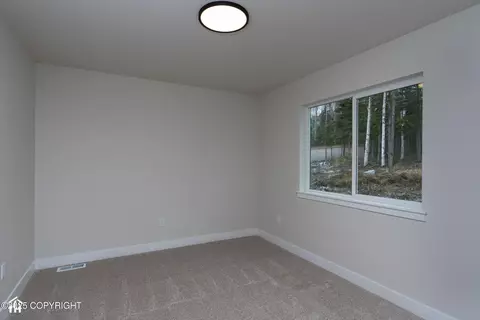 Bedroom - 17939 Yellowstone Dr, Eagle River, AK 99577 photo 8 of 9