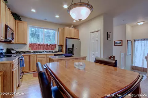 Kitchen - 20103 Riverside Dr # 1B, Eagle River, AK 99577 photo 2 of 3