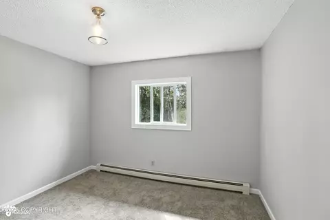 Bedroom - 11524 Lower Sunny Cir, Eagle River, AK 99577 photo 7 of 8