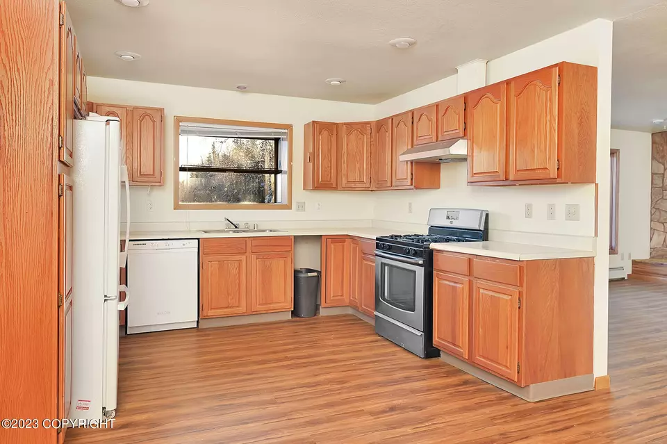 Kitchen - 1214 Fourth Ave, Kenai, AK 99611 photo 1 of 2