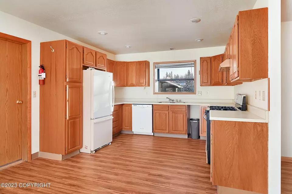 Kitchen - 1214 Fourth Ave, Kenai, AK 99611 photo 2 of 2