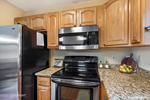 Kitchen - 19111 Sarichef Loop, Eagle River, AK 99577 photo 2 of 3