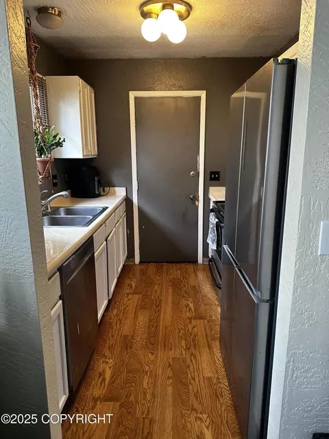 Kitchen - 8281 Stratton Cir, Anchorage, AK 99507 photo 1 of 2