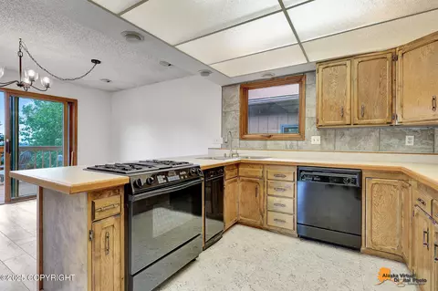 Kitchen - 18047 Sanctuary Dr, Eagle River, AK 99577 photo 2 of 3