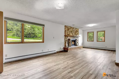 Living - 18047 Sanctuary Dr, Eagle River, AK 99577 photo 1 of 6