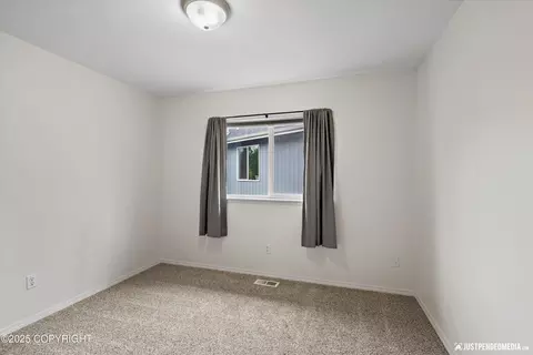 Bedroom - 9755 Newhaven Loop, Anchorage, AK 99507 photo 3 of 6