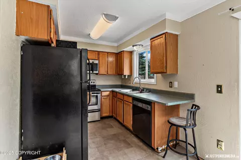Kitchen - 8051 Evans Cir, Anchorage, AK 99507 photo 1 of 3