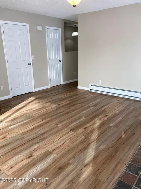 Living - 6521 E 9th Ave, Anchorage, AK 99504 photo 2 of 3