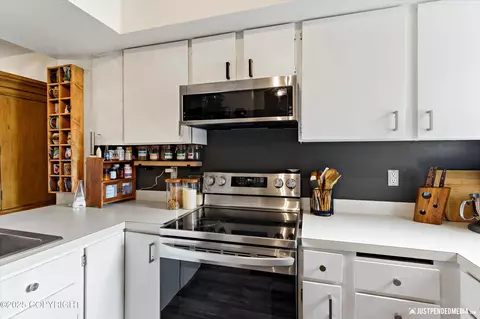 Kitchen - 417 Dailey Ave # K-16, Anchorage, AK 99515 photo 3 of 4