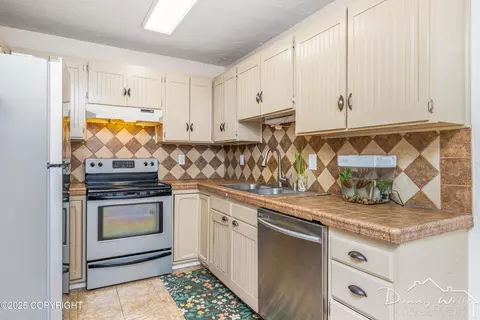 Kitchen - 9223 Elgin Cir, Anchorage, AK 99502 photo 2 of 2