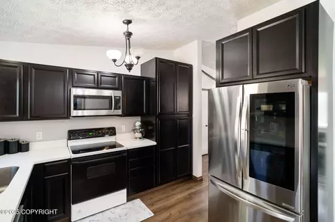 Kitchen - 12222 Winter Park Pl, Eagle River, AK 99577 photo 3 of 4