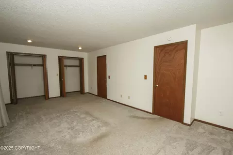 Bedroom - 18716 N Lowrie Loop, Eagle River, AK 99577 photo 4 of 8