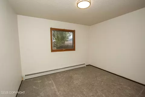 Bedroom - 18716 N Lowrie Loop, Eagle River, AK 99577 photo 7 of 8