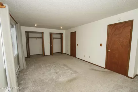 Bedroom - 18716 N Lowrie Loop, Eagle River, AK 99577 photo 3 of 8