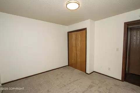 Bedroom - 18716 N Lowrie Loop, Eagle River, AK 99577 photo 8 of 8