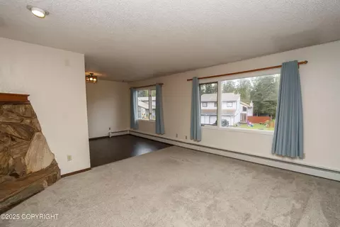 Living - 18716 N Lowrie Loop, Eagle River, AK 99577 photo 4 of 5