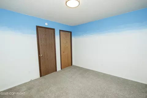 Bedroom - 18716 N Lowrie Loop, Eagle River, AK 99577 photo 6 of 8