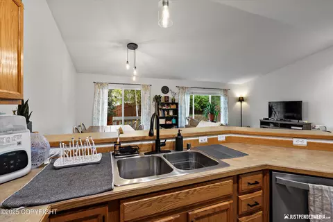 Kitchen - 8959 Eagle Place Loop # 29, Eagle River, AK 99577 photo 4 of 4