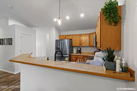 Kitchen - 8959 Eagle Place Loop # 29, Eagle River, AK 99577 photo 2 of 4