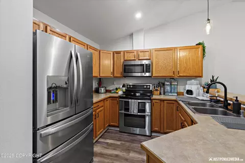 Kitchen - 8959 Eagle Place Loop # 29, Eagle River, AK 99577 photo 3 of 4