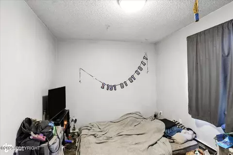 Bedroom - 6119 E 12th Ave, Anchorage, AK 99504 photo 8 of 8
