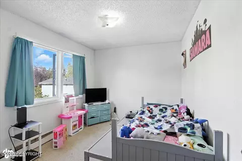 Bedroom - 6119 E 12th Ave, Anchorage, AK 99504 photo 5 of 8