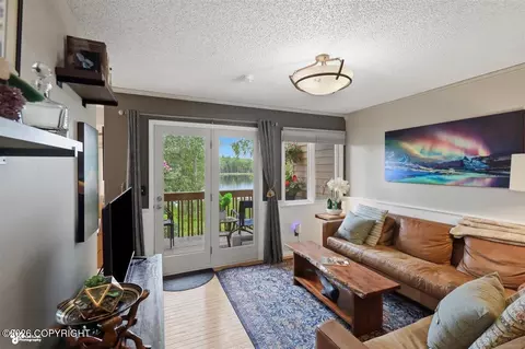 Living - 4157 Raspberry Rd, Anchorage, AK 99502 photo 7 of 8