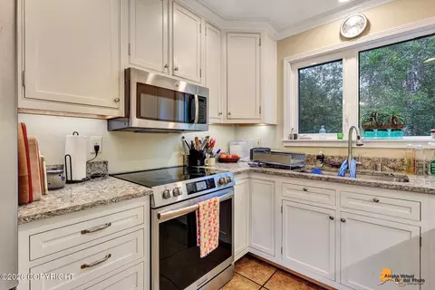 Kitchen - 6231 W Tree Dr, Anchorage, AK 99507 photo 3 of 5