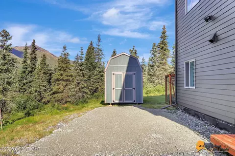 Exterior - 1910 S River Dr, Eagle River, AK 99577 photo 7 of 10
