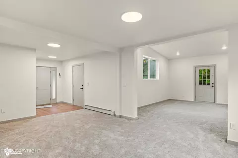 Living - 18045 Mendenhall St, Eagle River, AK 99577 photo 2 of 11