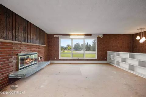 Living - 7007 E 16th Ave, Anchorage, AK 99504 photo 8 of 11