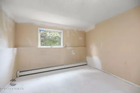 Bedroom - 7007 E 16th Ave, Anchorage, AK 99504 photo 5 of 6