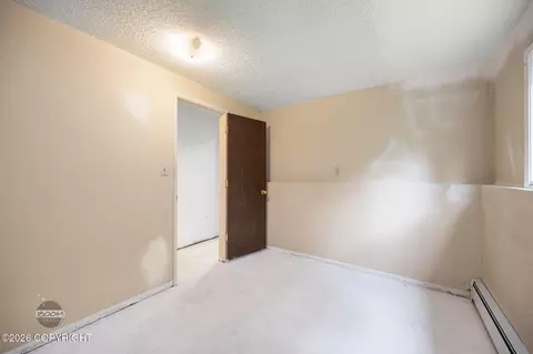 Bedroom - 7007 E 16th Ave, Anchorage, AK 99504 photo 6 of 6