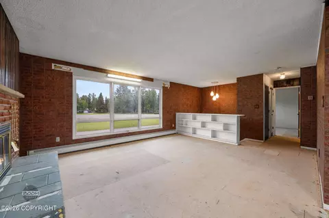 Living - 7007 E 16th Ave, Anchorage, AK 99504 photo 9 of 11