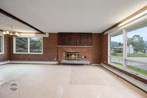 Living - 7007 E 16th Ave, Anchorage, AK 99504 photo 6 of 11