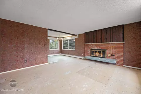 Living - 7007 E 16th Ave, Anchorage, AK 99504 photo 5 of 11